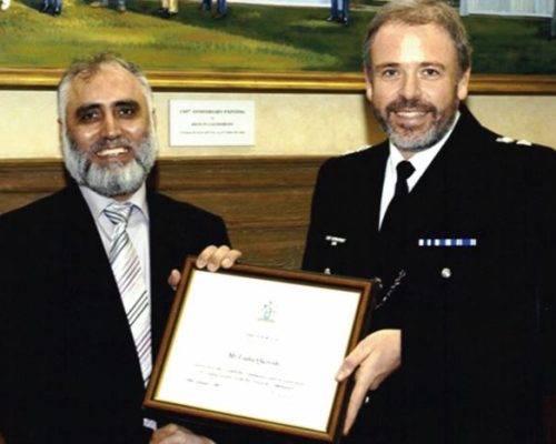 Being conferred a Metropolitan Police Service Commendation Award for services to the community by Borough Commander Richard 'Dick' Quinn.