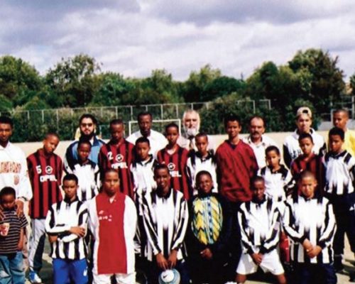 Group photo with young children who took part in a BME football tournament