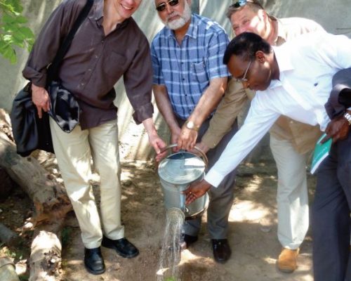 Planting a tree of peace at a church in Rawalpindi with Dr. Harald Weilnbock (Berlin University, Germany), Alan Weston (London Probation Trust), A R Tanko (SGCS), Rev. Mahboob (Rawalpindi).