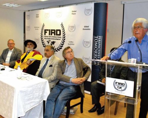 Prof Avi Shlaim (Emeritus Professor of International Relations at the University of Oxford) speaking at the FIRD Conference on “After 9/11 – The Arab Spring”. Also in the photo: Professor Jonathon Fryer, Andrew Hayward, Prof Z U Khan and Philip Lingard. 2012.